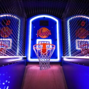 A colorful indoor arcade game showcasing basketball hoops in a vibrant setting, perfect for entertainment venues.